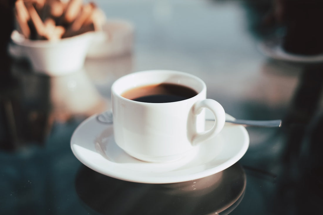 A warm cup of morning coffee on a sunlit table