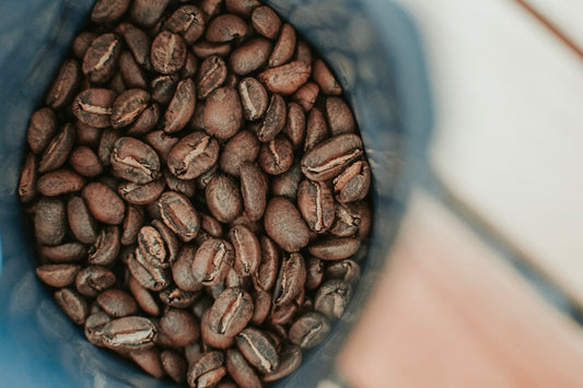 Close-up of freshly roasted brown coffee beans