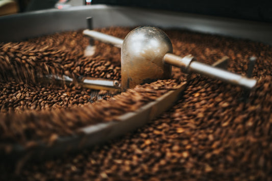 Coffee beans on a wooden tray ready for tasting and flavour evaluation