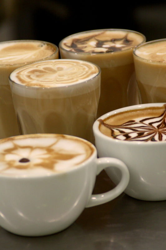 Several cups of coffee with beautiful latte art served at a Melbourne cafe